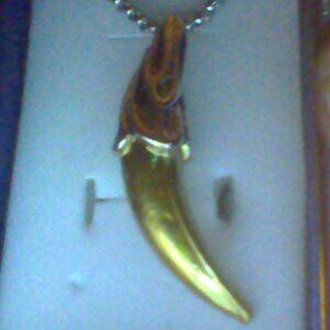 stainless steel necklace with gold plated wolf tooth